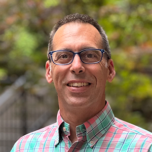 A headshot of Andrew Telep