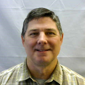 A headshot of Jim Fau
